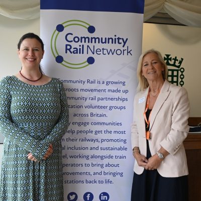 Sarah Russell MP, Louise Willis FoGS member, on, community rail
